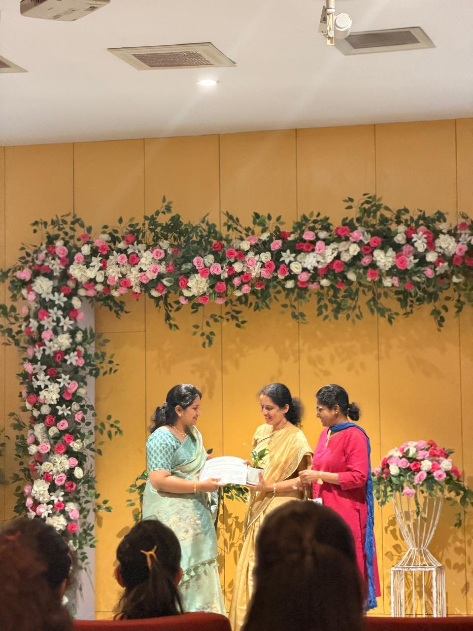 Dr. Shannon at menopause talk — receiving recognition