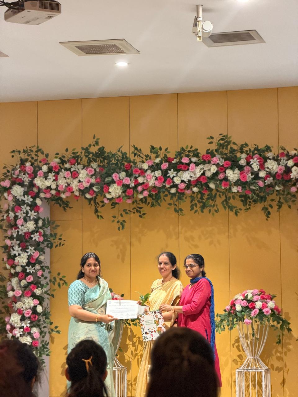 Dr. Shannon receiving certificate at menopause event